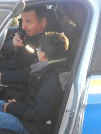 David im Polizeiauto